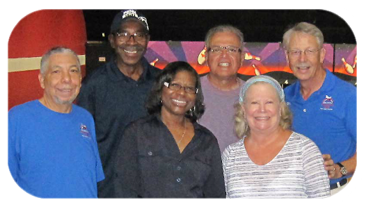Shown from left: Harold Miller, John and Michelle Green, Michael and Ilene Malpero, Ellis Moose